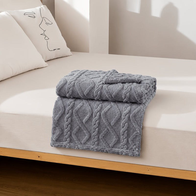 Sorvane Throw – Knitted Relief Design for Warmth
